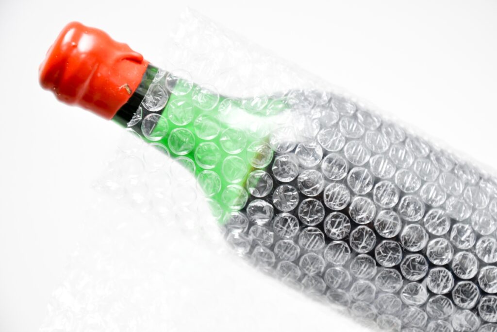 Why Wrap Wine Bottles in Plastic Wrap
